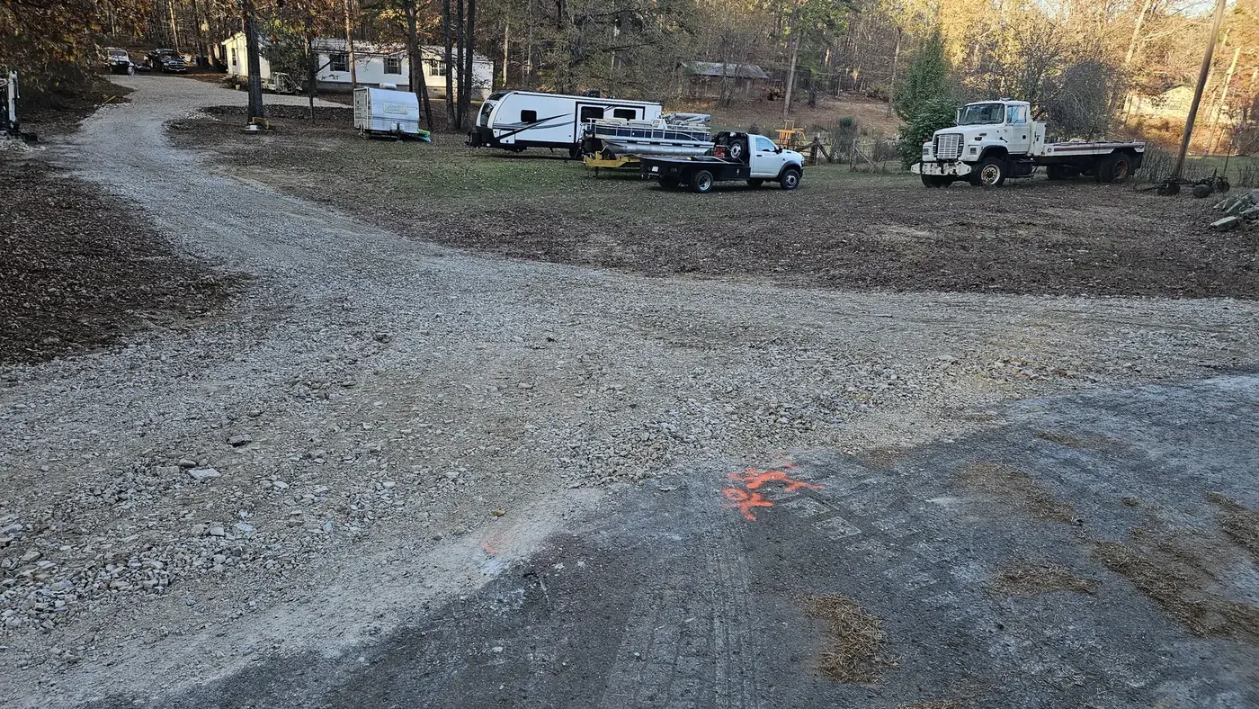 Driveway area before new gravel and grading