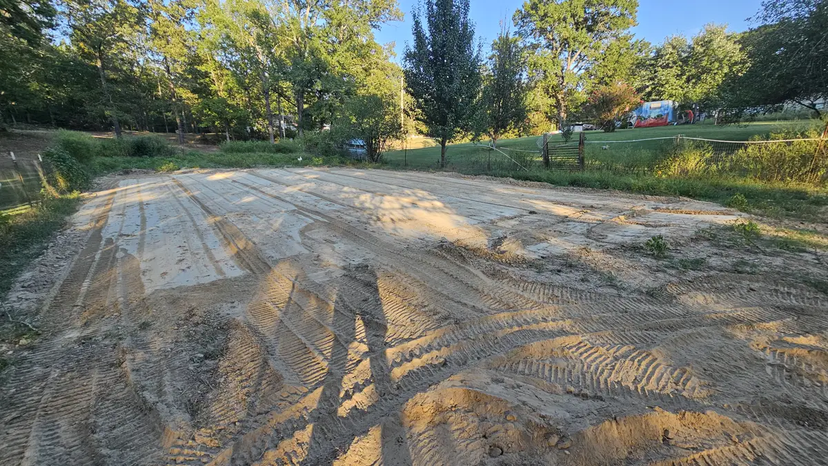 Graded ground on an open lot