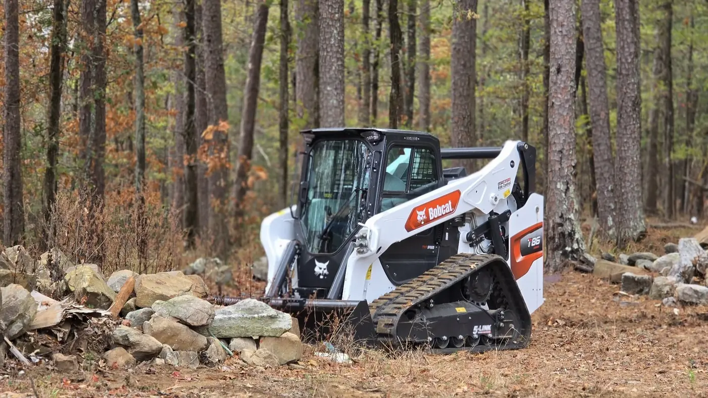 Kingdom Land Services Bobcat T86 working in the woods