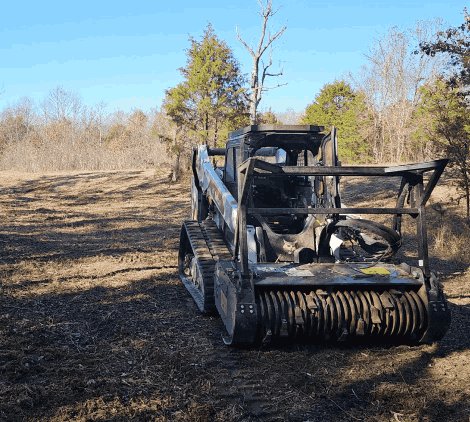 Forestry mulcher working through thick vegetation